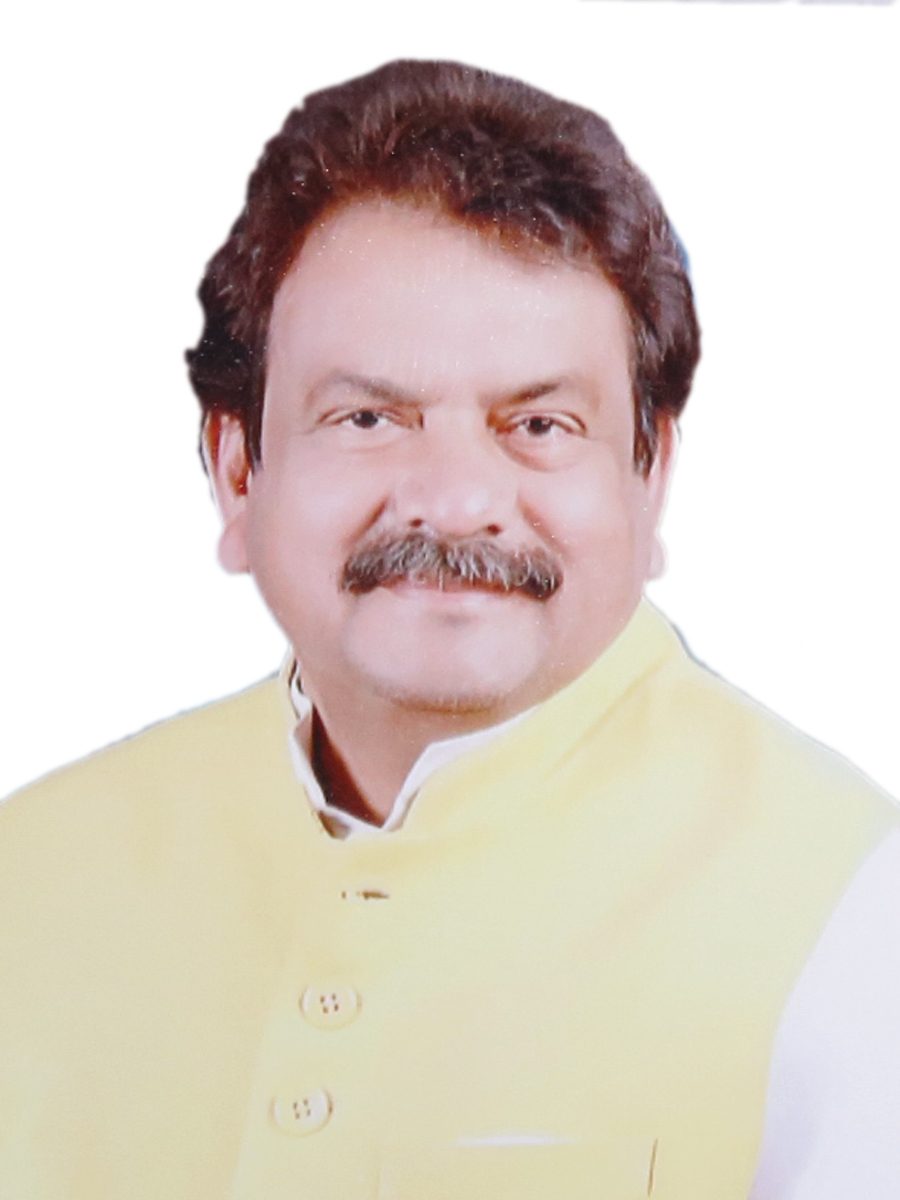 Official portrait of Satyapal Singh Baghel in a pale yellow sleeveless jacket